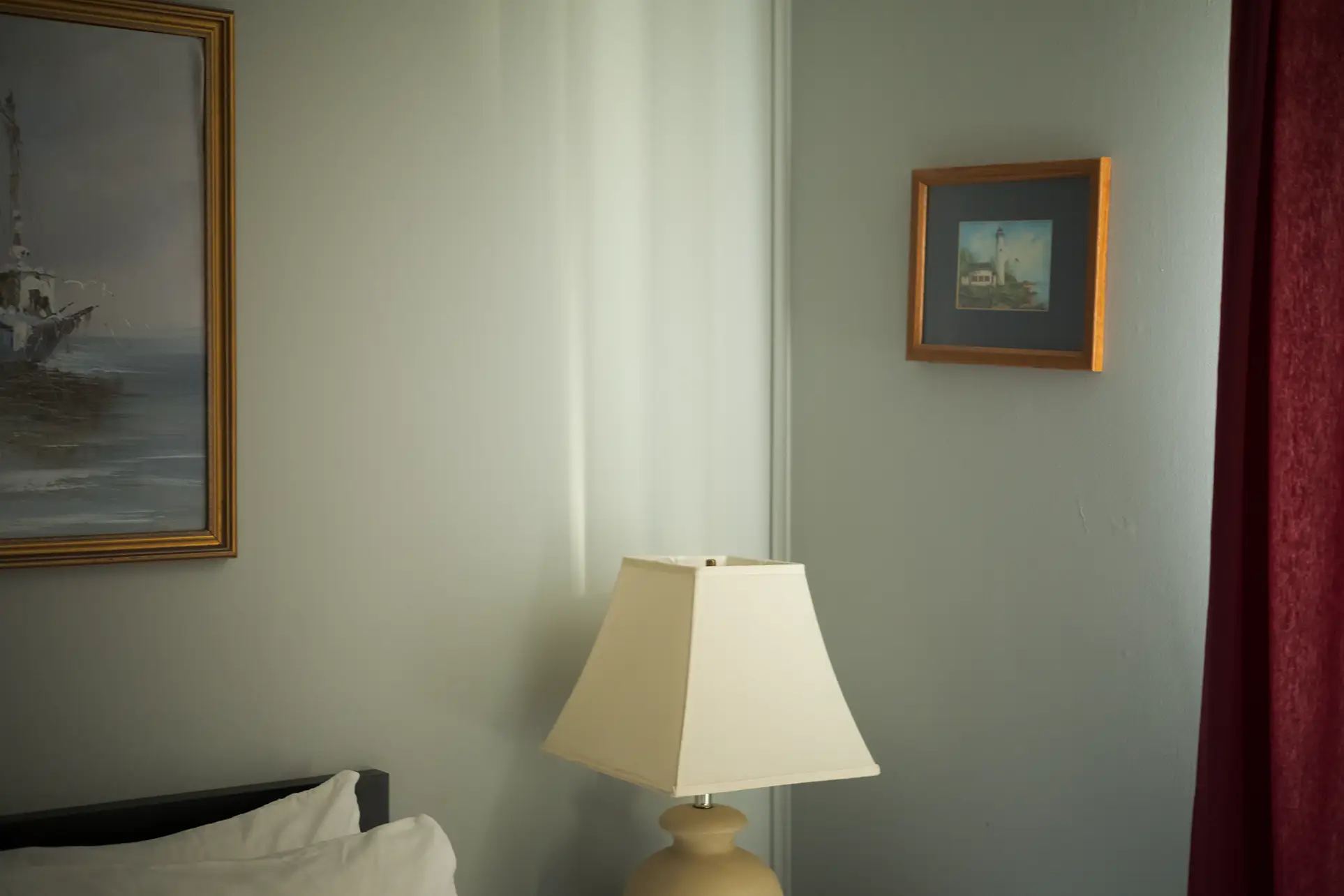 Sunlight cast on a bedroom wall in a hotel in Montauk, NY.